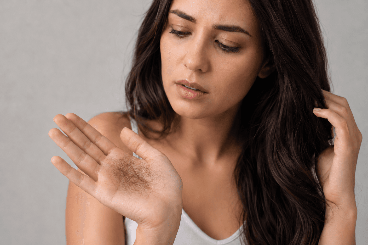 Why Is My Hair Falling Out? Understanding Hair Loss & How to Fight Back